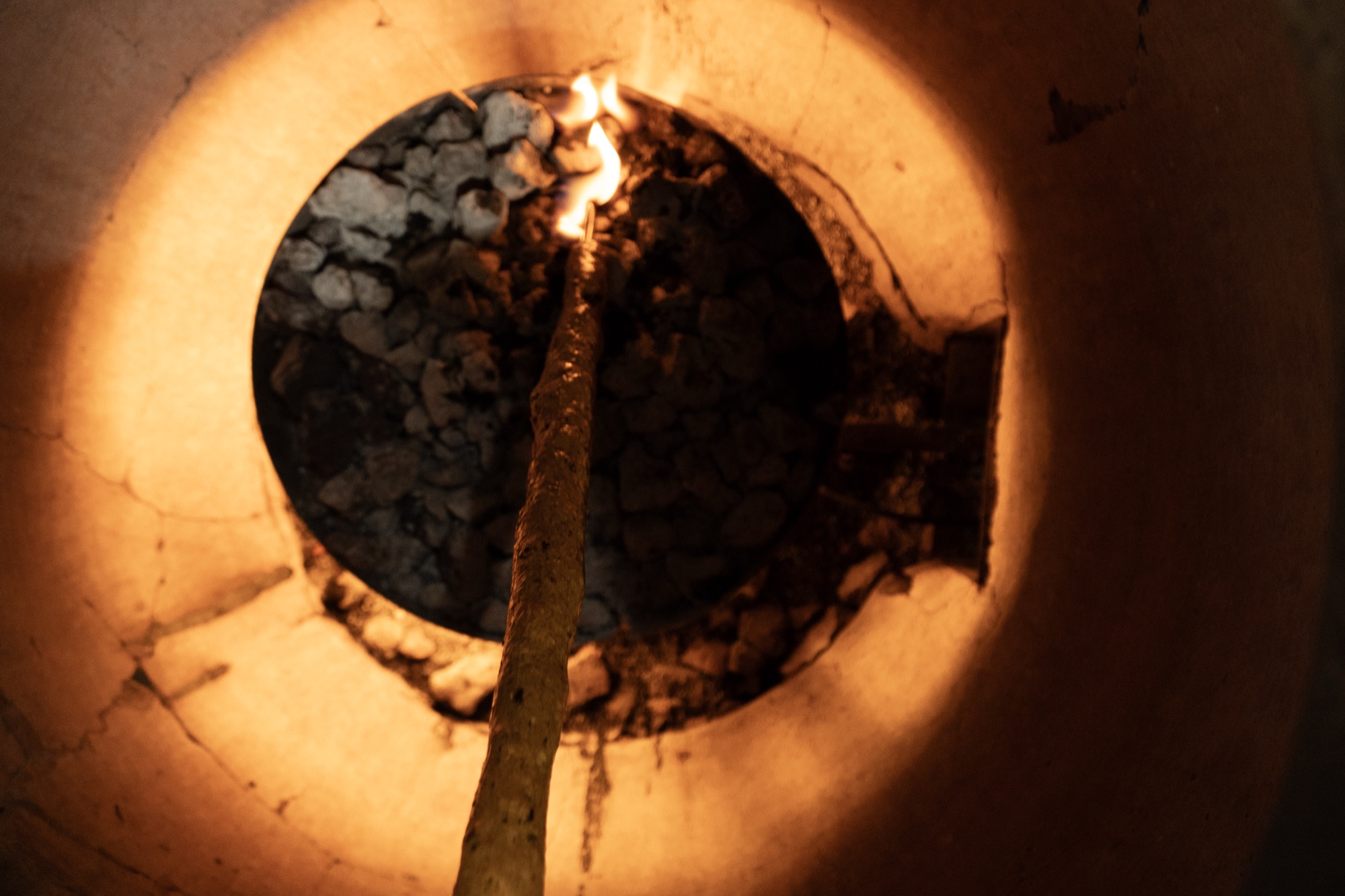 Skewer roasting over the glowing coals of the tandoor